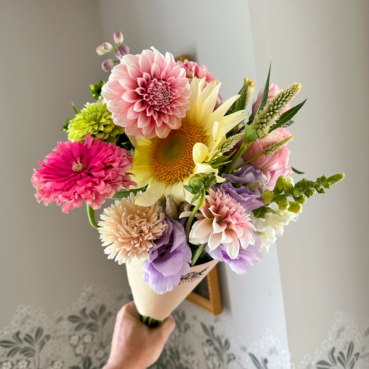 Medium hand-tied garden bouquet in soft pastel tones — sustainably grown flowers from Pocket's Cottage farm in Red Hook, NY
